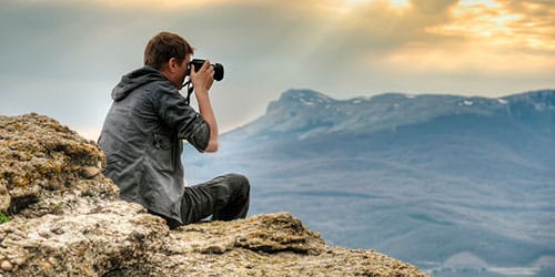 к чему снится фотографировать