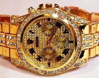 Золотые наручные часы