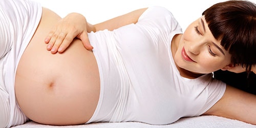 к чему снится трогать живот беременной